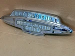 1946 47 48 Oldsmobile Hydra Matic Drive Trunk Emblem Gm 553762 Very Nice!. Fixed Price $199.99.