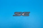 1997-2002 Pontiac Grand Prix Se Side Door Emblem Grey 2.625'' Oem 10246505. Fixed Price $18.89.