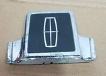 Lincoln Town Car Trunk Swing Emblem Lock Key Cover, Part 5443320 - Worn. Fixed Price $12.00.