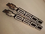 Set Of Gm Chevrolet 2500 Bowtie Door Emblems With Moldings. Fixed Price $62.99.