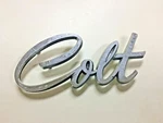 1974 - 1979 Dodge Colt Script Front Fender Emblem MB028718. Fixed Price $19.99.