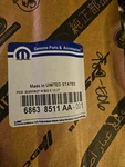 Genuine Mopar Front Door Nameplate 68638511AA. Fixed Price $30.00.