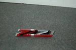 Used 2022 - 2025 Gm 84319918 Z71 Grille Emblem Red Silverado Tahoe Suburban. Fixed Price $30.00.