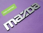 BIN21 Genuine Mazda Porter E360 Truck 1977-84 Emblem Script Badge # 1345-51-711A. Fixed Price $21.99.