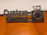 1975-1980 Custom Deluxe 10 Chevy Square Body Chevrolet Badge Emblem 349682-1. Fixed Price $34.95.