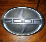 Scion Front Grille Silver Black Emblem Badge Oem 75311-12B80. Fixed Price $20.00.